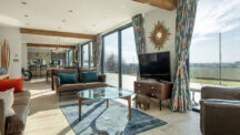 Discover how Express Bi-Folding Doors creates seamless indoor-outdoor living at the Codbeck House.